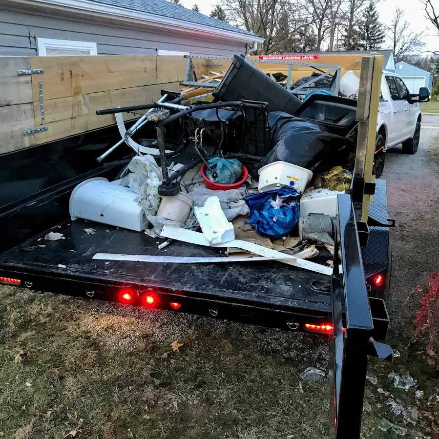 Roll-off dumpster delivered to a residential driveway in Albion