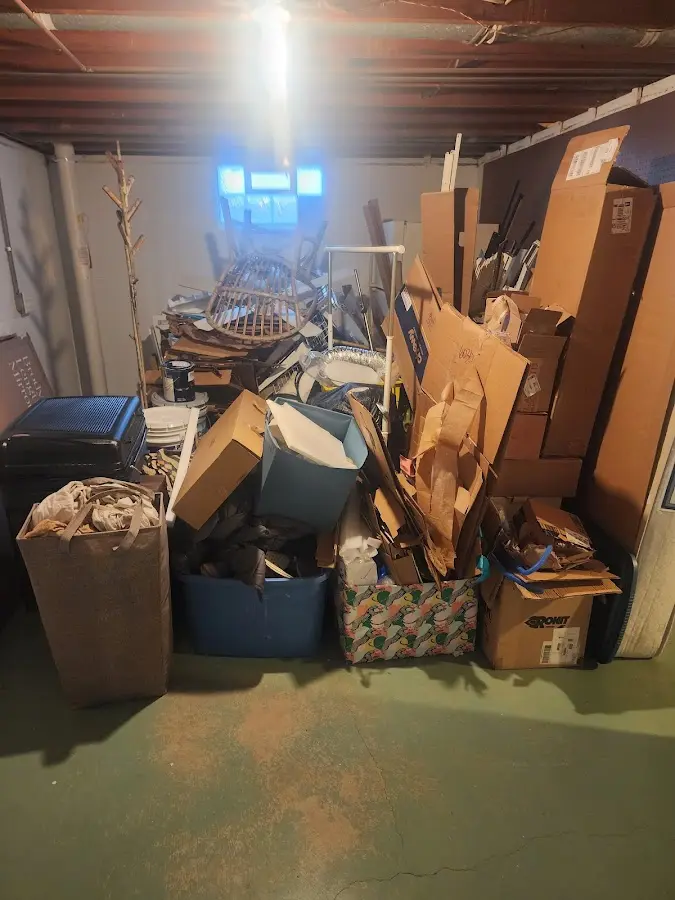 Roll-off dumpster container at job site for 2 Yard Dumpster Rental in Albion